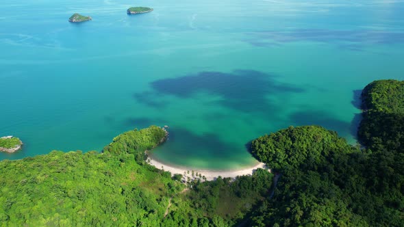 An aerial view of the coast, mountains with many beautiful islands