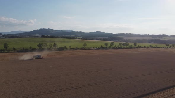 Harvester In A Beautiful Countryside