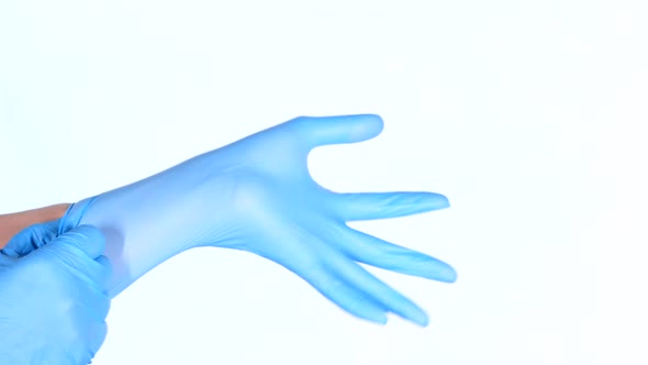 Doctor Wears Medical Latex Gloves Isolated on White