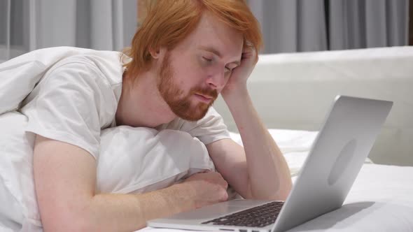 Man Sleeping in Bed Working Laptop in Bed