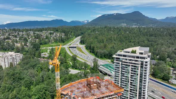 Lush Green Trees At The Park Near The Trans-Canada Highway In North Vancouver, Canada. - aerial