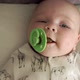 Baby Lies on Her Back and Spits Out Soother - VideoHive Item for Sale