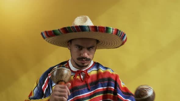 Young Mexican With Moustache Isolated On Yellow