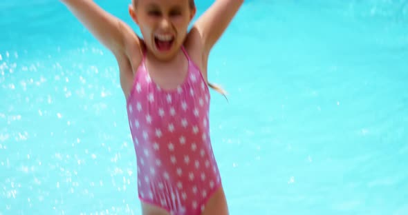 Girl enjoying in swimming pool