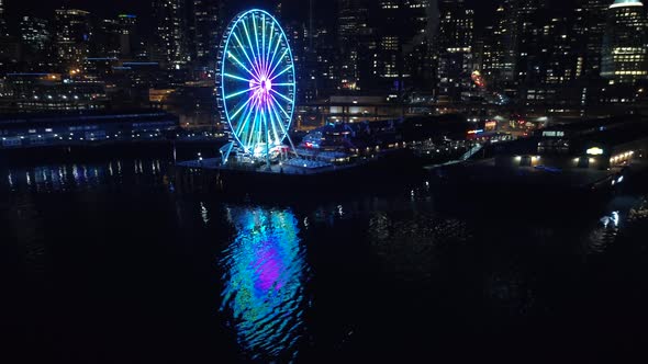 City Night Waterfront With Colorful Light Reflection