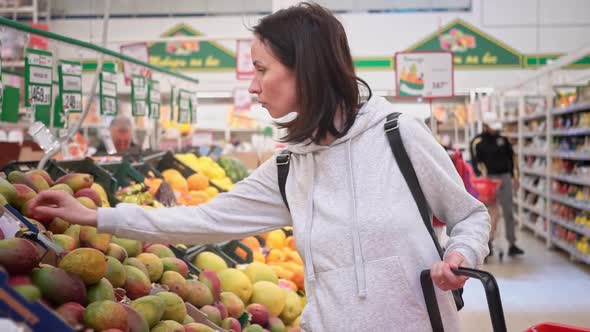 Young Woman Shopping at the Grocery Store for Healthy Food