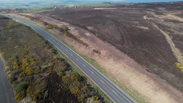 Panoramic Moorland And Public Freeway In North York Moors National Park, England, UK. Aerial Descend