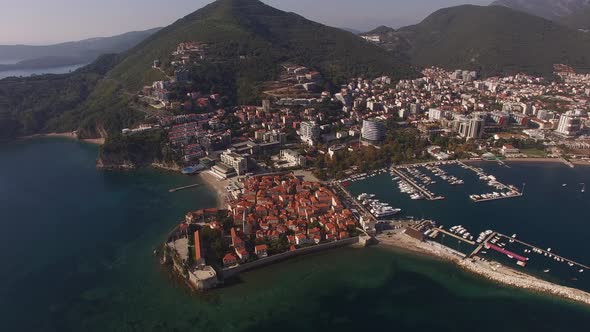 View of the Pier Near the City of Budva at the Foot of the Mountains