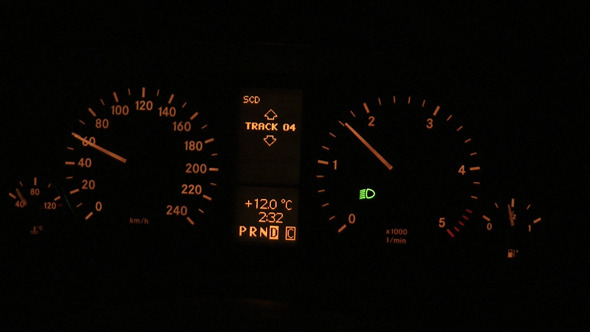 Car Speedometer During a Night Time Drive