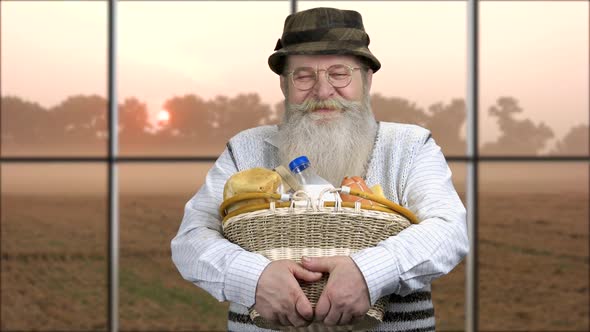 Happy Farmer Holding Basket of Dairy Products