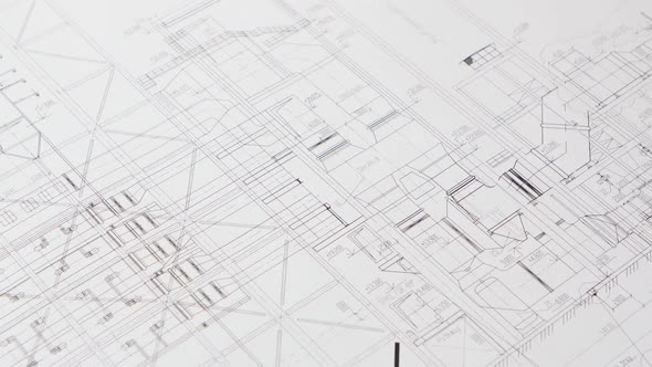 Engineer Looks at the Data for the Building's Most Complete Building. Close Up