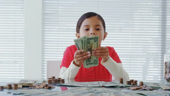 Girl as executive counting the bank notes 4K 4k