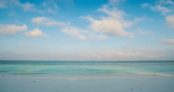 Time lapse: morning time on white sand beach tropical sea colorful dramatic sky