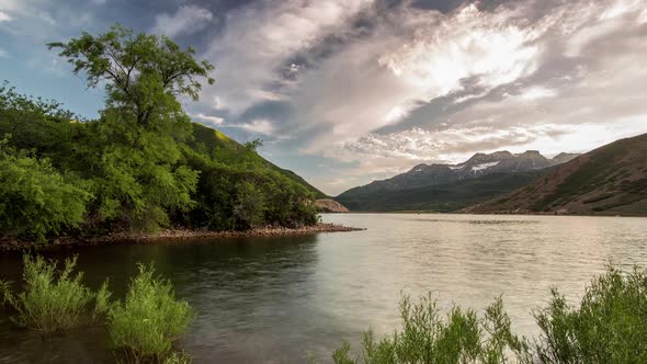 Time lapse at Deer Creek Reservoir with Timpanogos Mountain on the Horizon