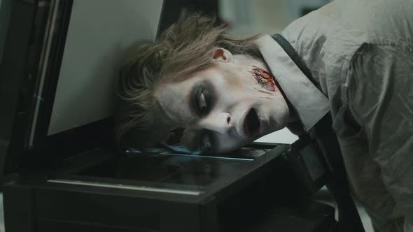 Zombie Office Worker Photocopying his Face