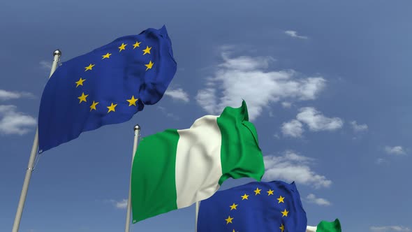 Flags of Nigeria and the European Union Against Blue Sky