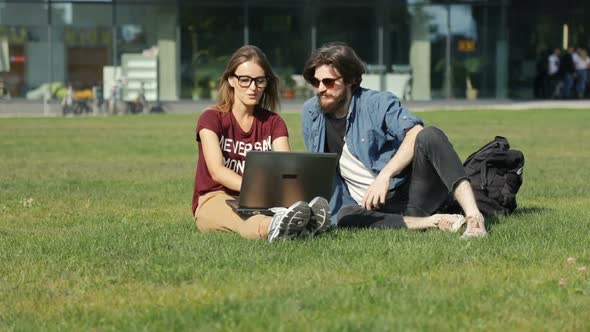 IT Workers on Grass