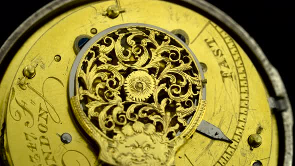 Gears the Mechanism of a Vintage Pocket Watchl. Close Up. Back Background. Sound