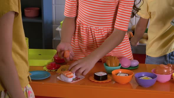 Close Up Kids Cooking Sushi with Toy Kitchen