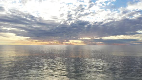 AERIAL: Flying Very Low Above Baltic Sea During Golden Hour Towards Horizon