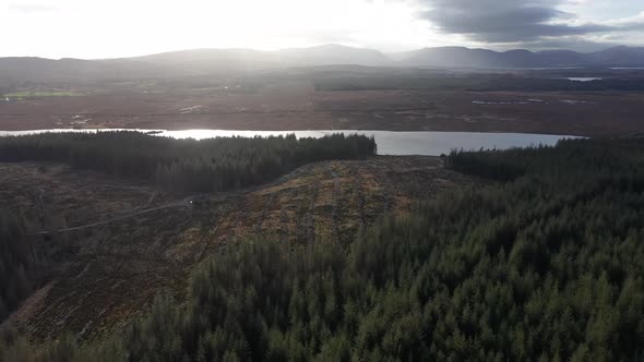 Flying Next To Forest Close To the Town Glenties in County Donegal - Ireland