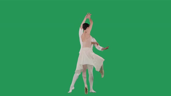 Professional Ballet Pair Practicing Moves on Green Screen