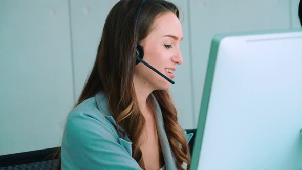 Business People Wearing Headset Working in Office