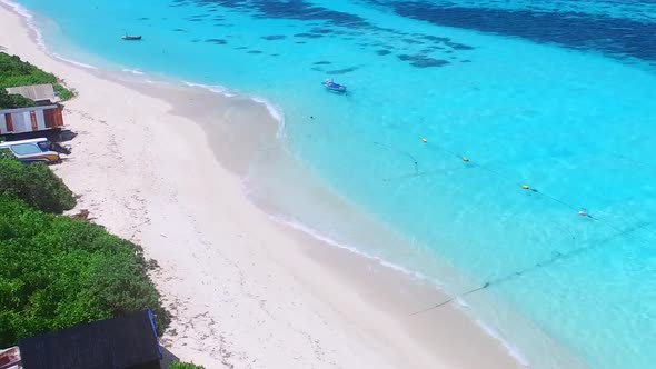 Drone view scenery of seashore beach trip by clear water with sand background