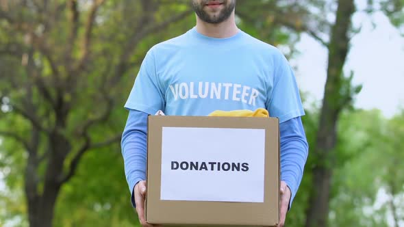 Bearded Male Volunteer Holding Donation Box, Philanthropy Social Charity Project