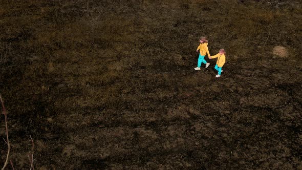 Ukrainian Girls in Clothes in the Colors of the Ukrainian Flag on the Ground