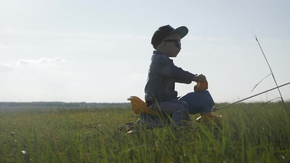 Toddler Kid in Funny Glasses Biking. Helping To Ride a Bike. Learning To Ride a Bike Concept.