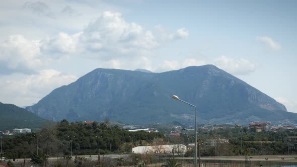 Timelapse of mountains landscape with clouds and sky. 