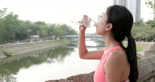 Sport woman drink of water