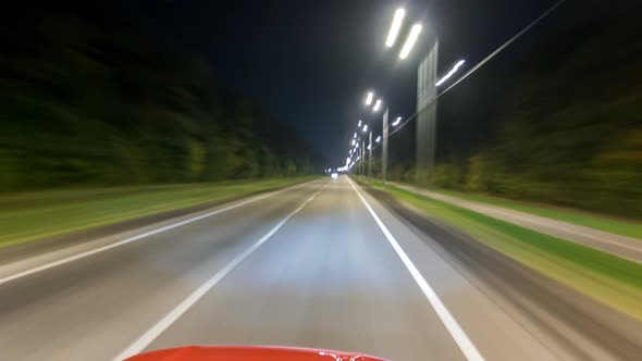 Drivelapse From Top Side of Car Moving on a Night Highway Timelapse Hyperlapse