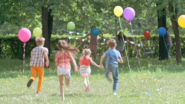 Kids Giving Hugs to Mom