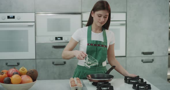 A Girl in a Green Apron