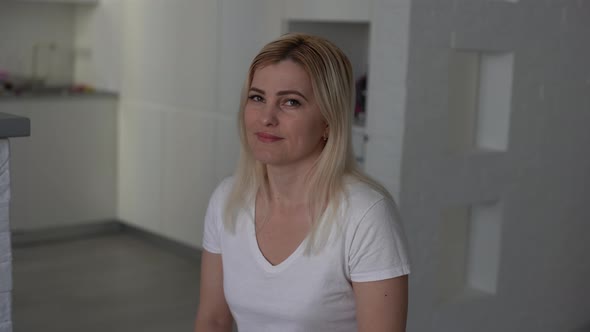 A Woman Standing in Front of a Building