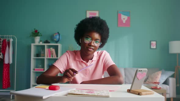 Portrait of Woman Student in Pink TShirt