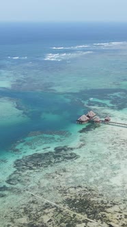 Tanzania  Vertical Video House on Stilts in the Ocean on the Coast of Zanzibar Slow Motion