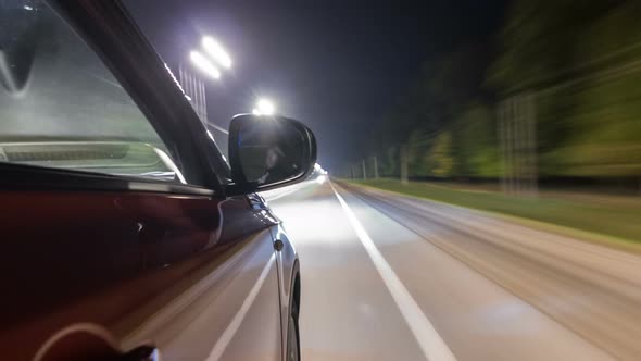 Drivelapse From Side of Car Moving on a Night Highway Timelapse Hyperlapse