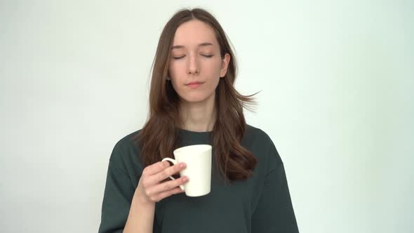 Young Woman with Toothache Drinking Cold Water