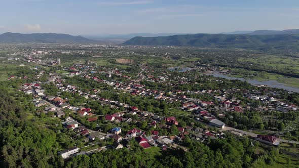 Aerial View City Of Solotvino Ukraine. Flying Over a City with Salt Lakes and Salt Mining Mines