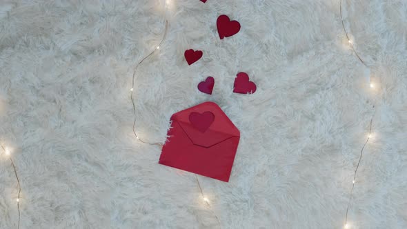 Red Letter for Valentines Day with Red Hearts Background