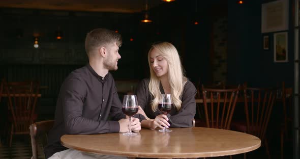 Man and Woman Having a Date in a Restaurant