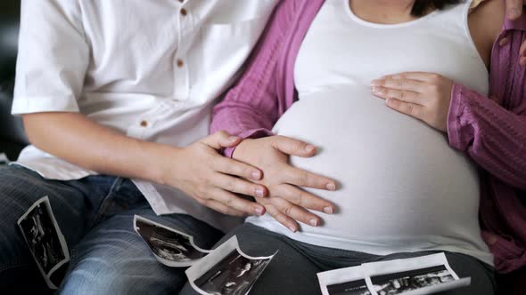 Pregnant Couple Feels Love and Relax at Home