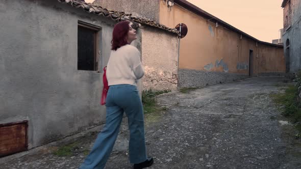 Girl visits a medieval village