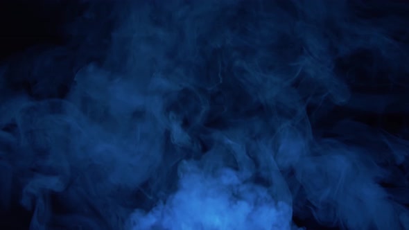 Smoke texture over blank black background. Mystical steam at night.