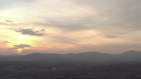 Beautiful colors of sky above Deli Jovan mountain 4K aerial video