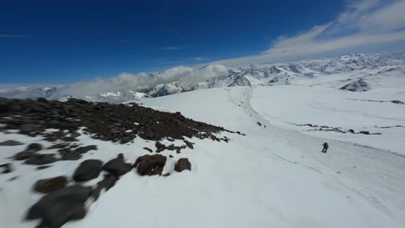 Aerial Fpv Drone View Group of Climbers Going on Top of High Mountain Nature Scenery Winter Day