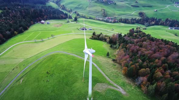 Aerial video of a wind turbine from above in Entlebuch, Switzerland